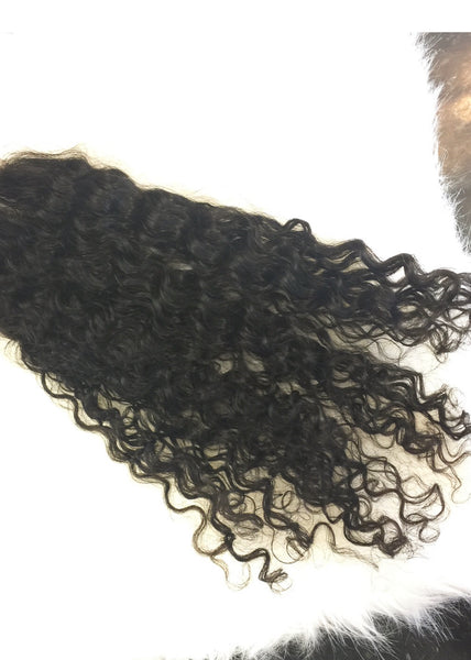 Exotic Curly Clip In Ponytail
